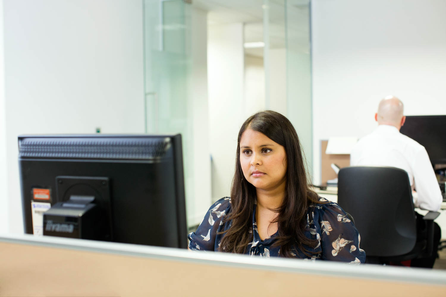 A woman working at a computer