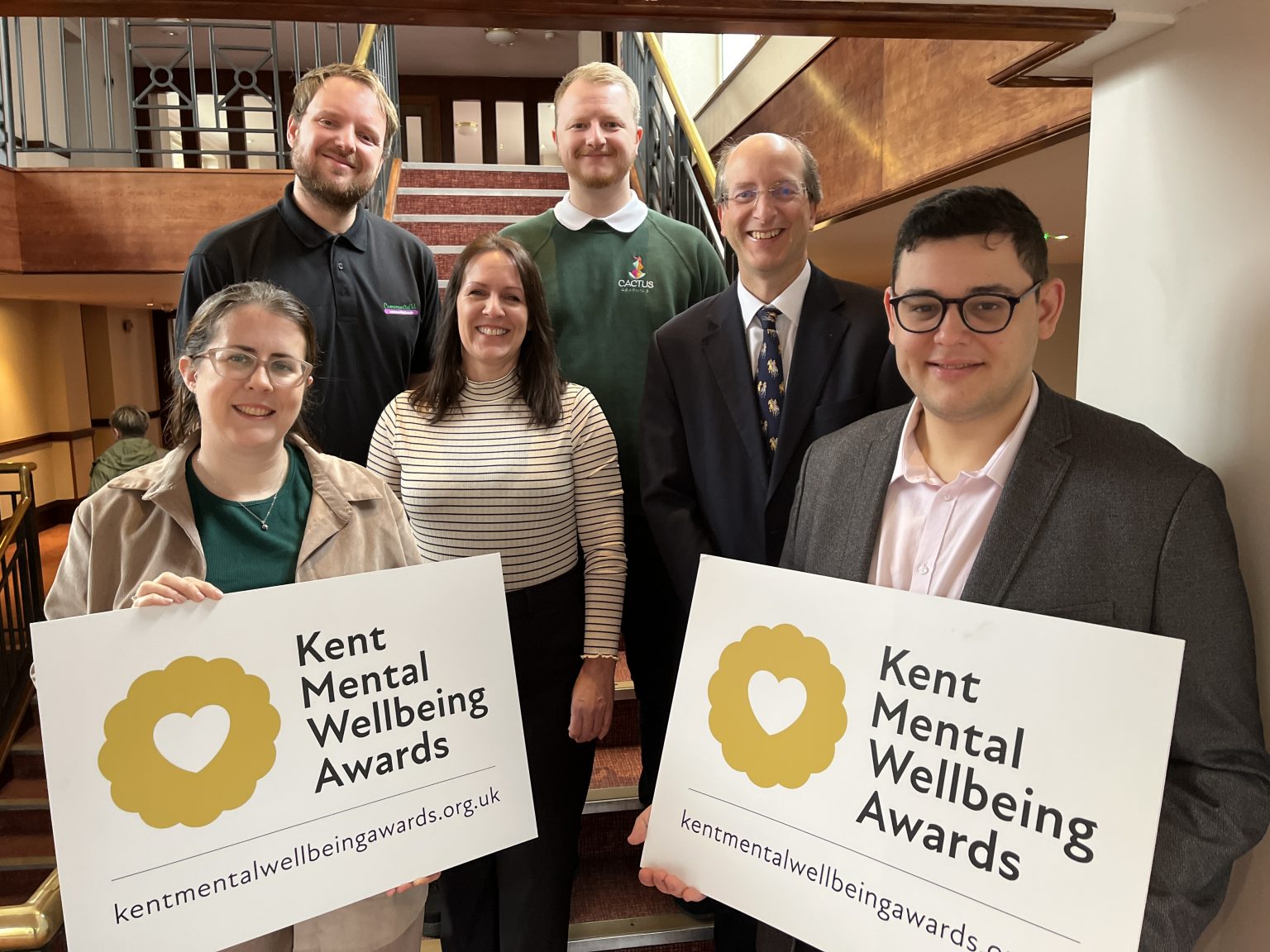 Group shot of individuals at wellbeing awards